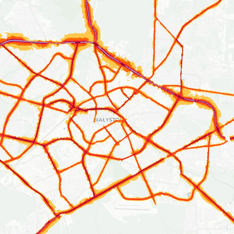 Noise map of Bialystok, Poland: road-traffic noise contours from the EU strategic noise maps, shaded yellow (≈55 dB Lden) through orange and red to dark purple (≈75 dB+), over the city's street network.