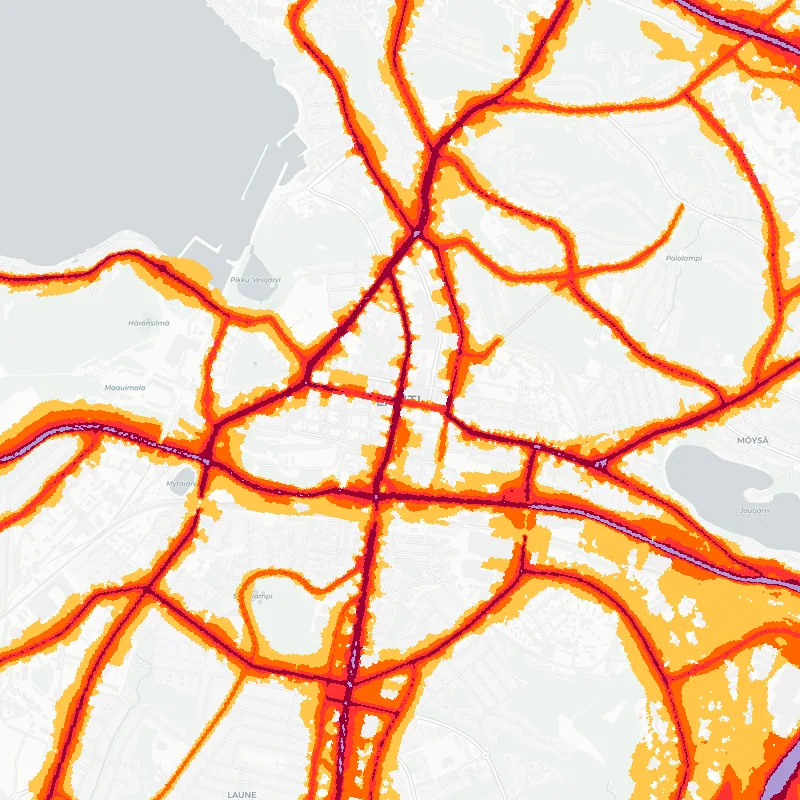 Noise map of Lahti, Finland: road-traffic noise contours from the EU strategic noise maps, shaded yellow (≈55 dB Lden) through orange and red to dark purple (≈75 dB+), over the city's street network.