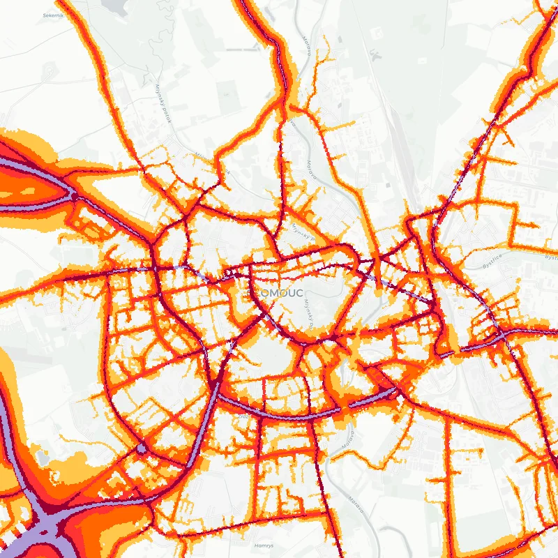 Noise map of Olomouc, Czech Republic: road-traffic noise contours from the EU strategic noise maps, shaded yellow (≈55 dB Lden) through orange and red to dark purple (≈75 dB+), over the city's street network.