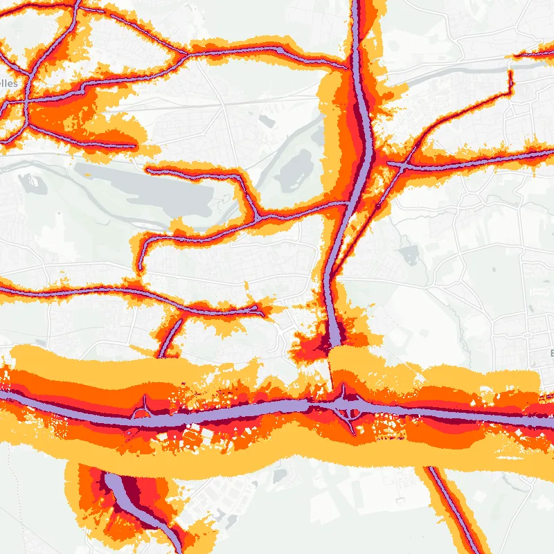 Noise map of Torcy, France: road-traffic noise contours from the EU strategic noise maps, shaded yellow (≈55 dB Lden) through orange and red to dark purple (≈75 dB+), over the city's street network.