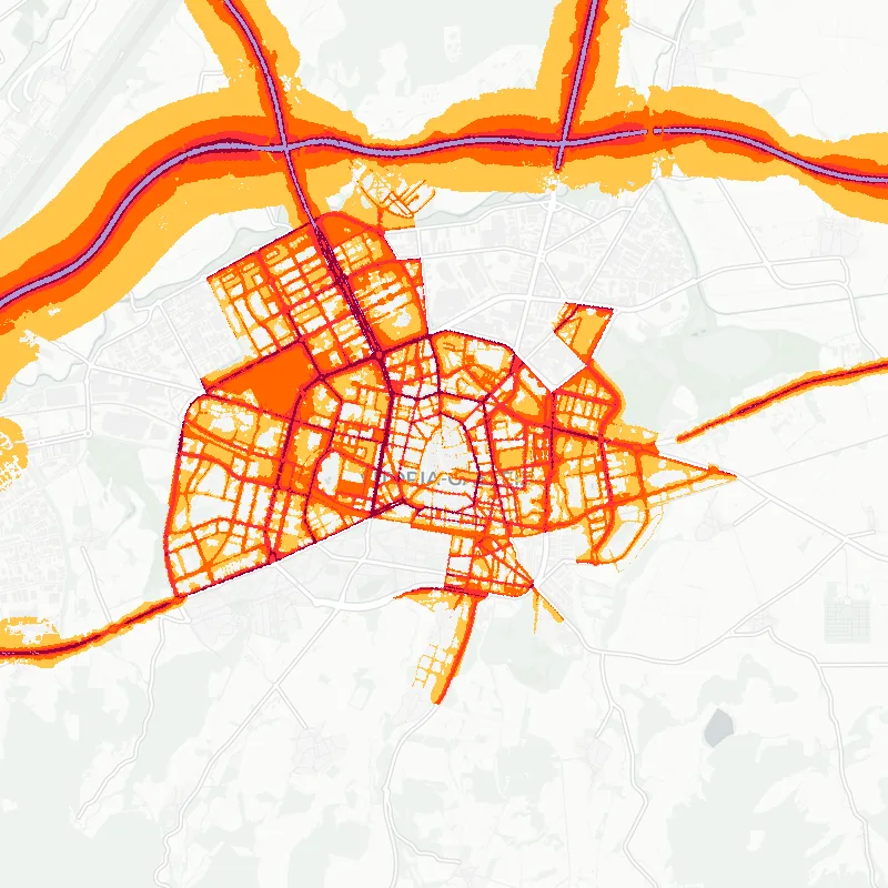 Noise map of Vitoria - Gazteiz, Spain: road-traffic noise contours from the EU strategic noise maps, shaded yellow (≈55 dB Lden) through orange and red to dark purple (≈75 dB+), over the city's street network.