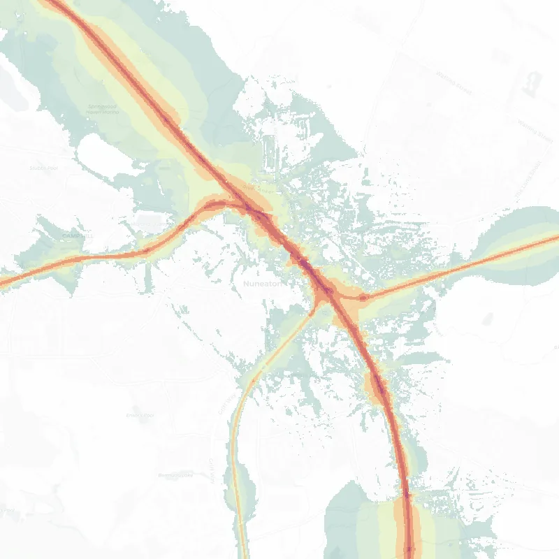 Noise map of Nuneaton: modelled railway noise (Lden) from the official strategic noise mapping, paler colours marking quieter levels and deepening through orange to dark purple along the loudest corridors, over the city's street network.
