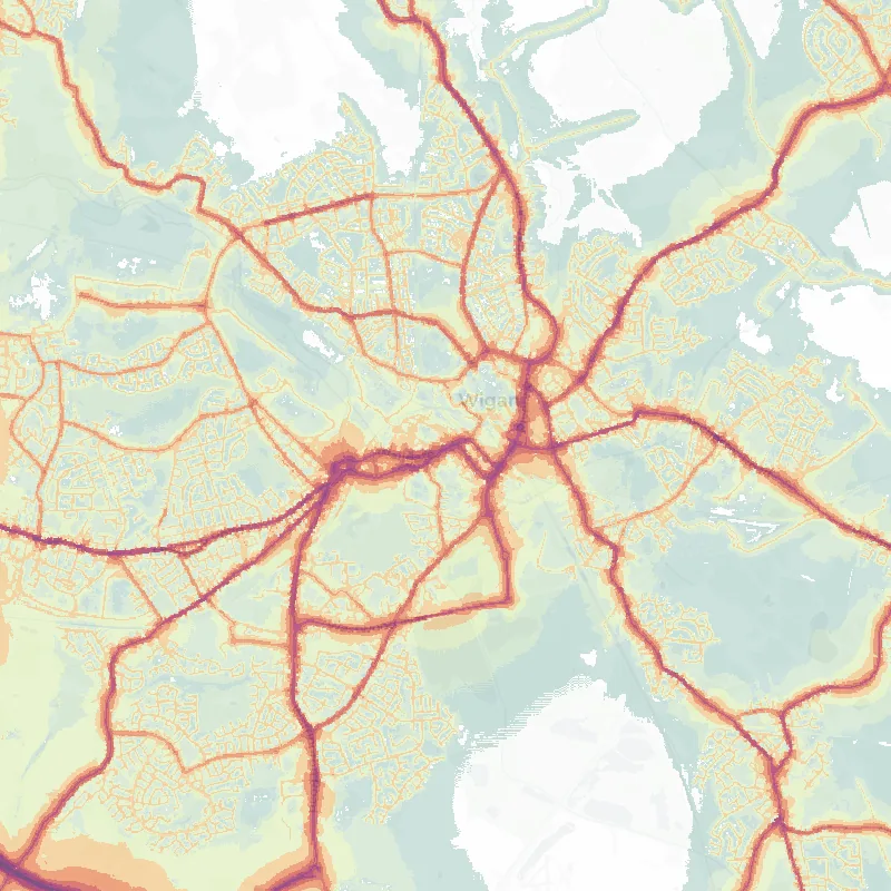 Noise map of Wigan: modelled road-traffic noise (Lden) from the official strategic noise mapping, paler colours marking quieter levels and deepening through orange to dark purple along the loudest corridors, over the city's street network.